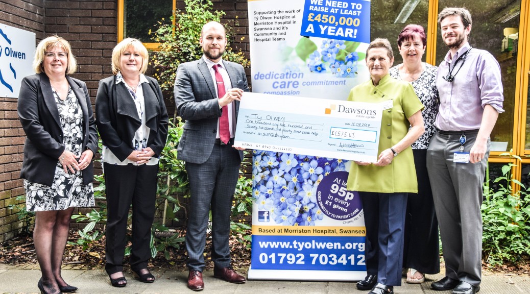 L-R Andrea Devoy, Office Manager at Dawsons’ Morriston branch, Tracy Sturgess, Associate at Dawson’s Morriston Branch, James Smale, Senior Negotiator at Dawson’s Morriston Branch, Delyth Gough, Trustee of Ty Olwen Trust, Helen Murray, Chairman of Ty Olwen Trust, and Dr Owain Thomas