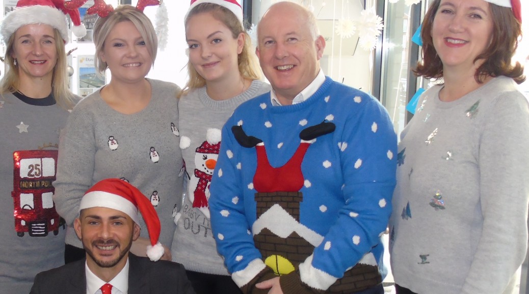 Dawsons staff at the Marina office sporting their Xmas jumpers