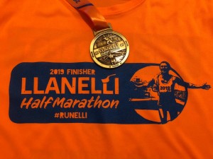Matthew Whitehead ran the Llanelli half marathon in aid of a sick colleague at Dawsons
